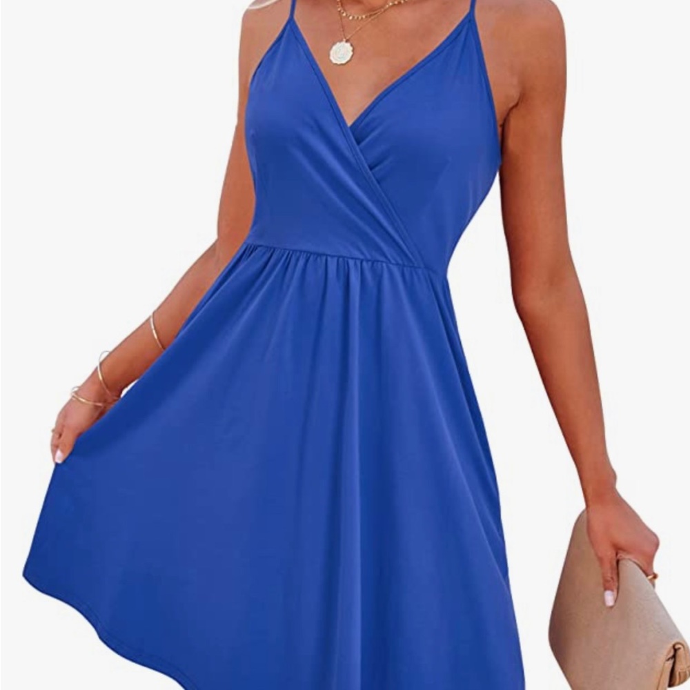 Woman’s bright blue summer dress.